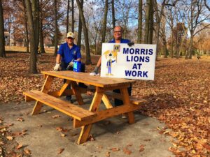 IMG_7554.sealing-new-donated-picnic-table-Larry-and-Steve